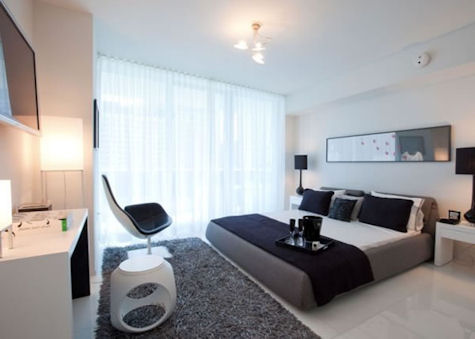 A Bedroom at The Epic Residences & Hotel